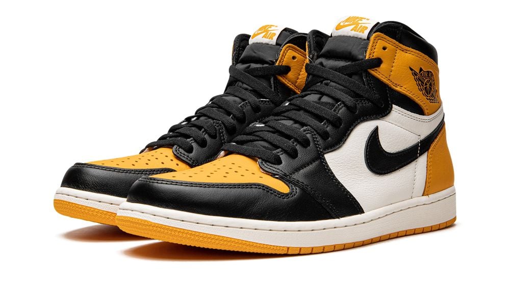 Air Jordan 1 Retro High OG “Taxi” – elölnézet, perforált toebox és fekete Swoosh