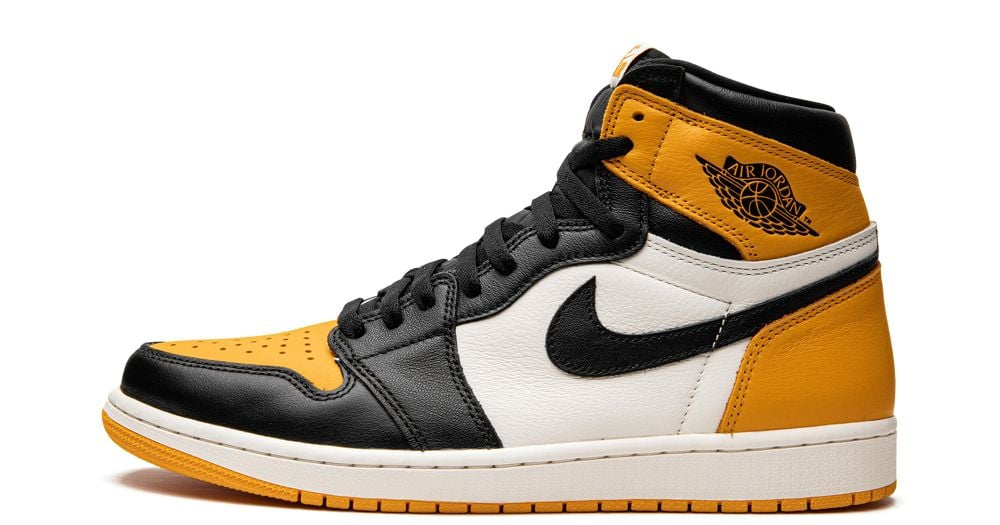 Air Jordan 1 Retro High OG “Taxi” – oldalnézet, fehér bőr alap és sárga toe box