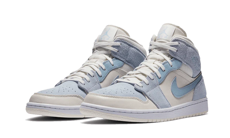 Jordan 1 Mid Mixed Textures Blue – elölnézet, perforált orr és textúrák