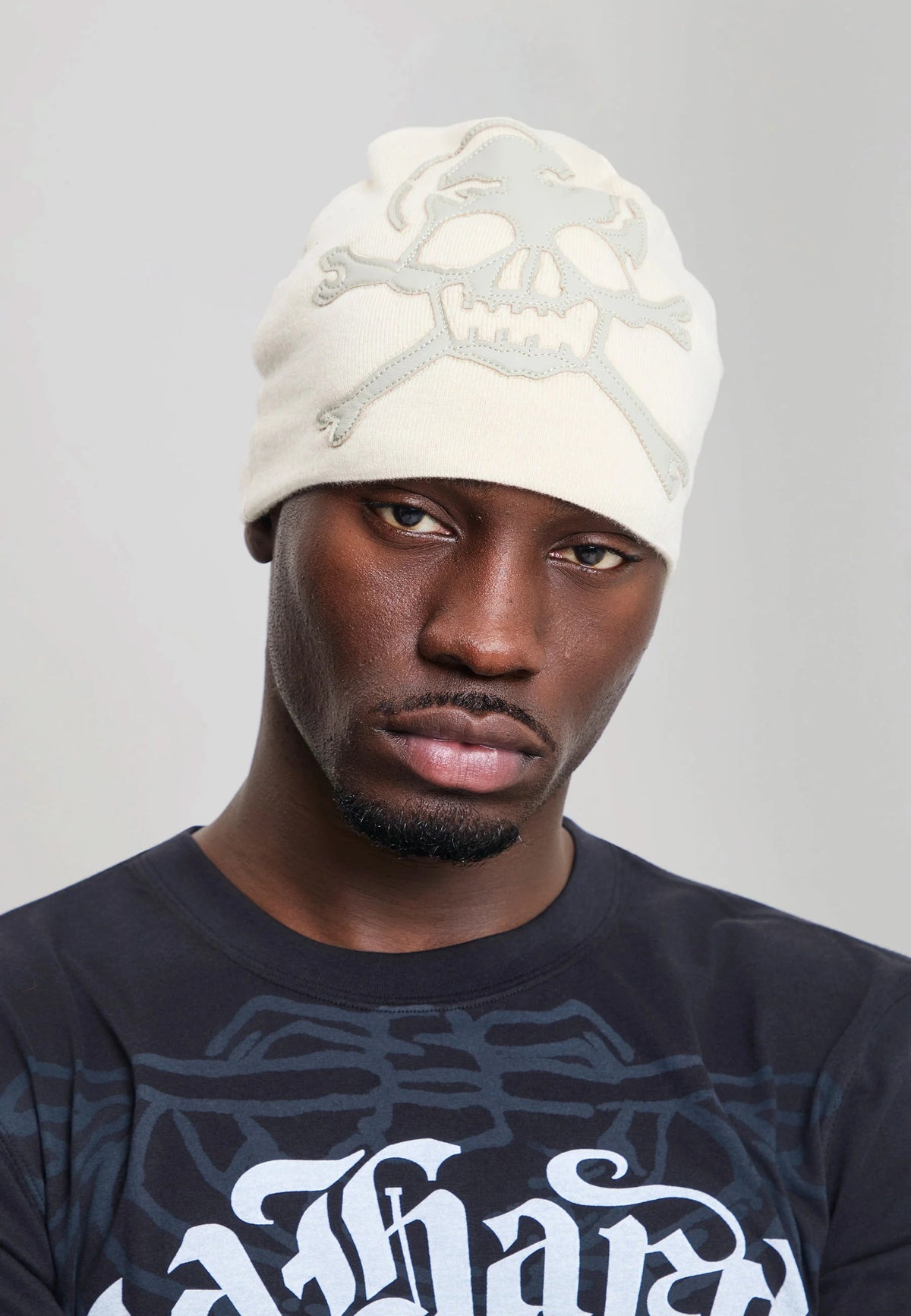 Ed Hardy Skull Vegan Leather Applique Cream Beanie - OnSize