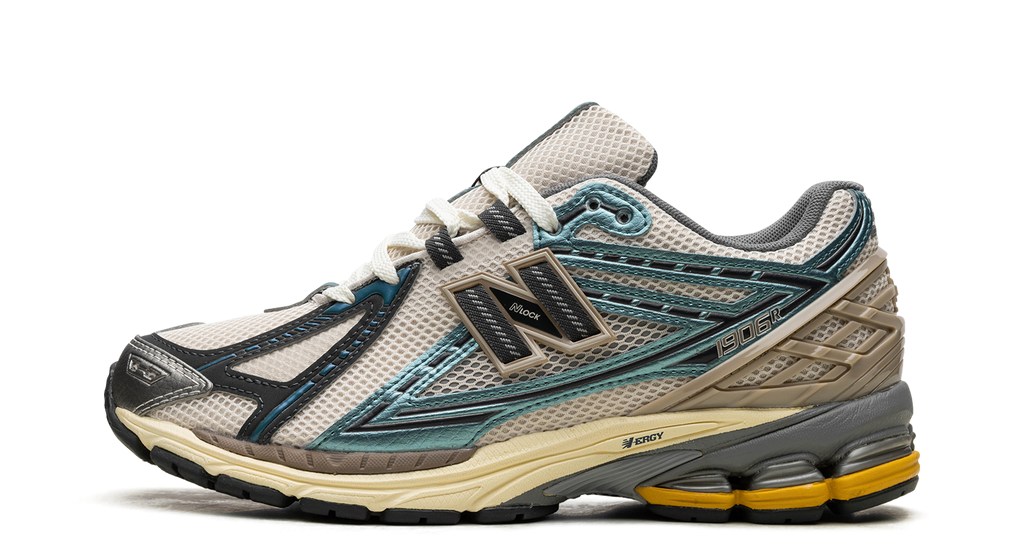 New Balance 1906R Metallic Teal New Spruce – oldalnézet, krémszínű mesh és fémes teal ráhajtások